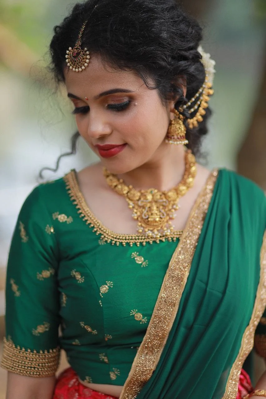 south indian bride in green dhavani look