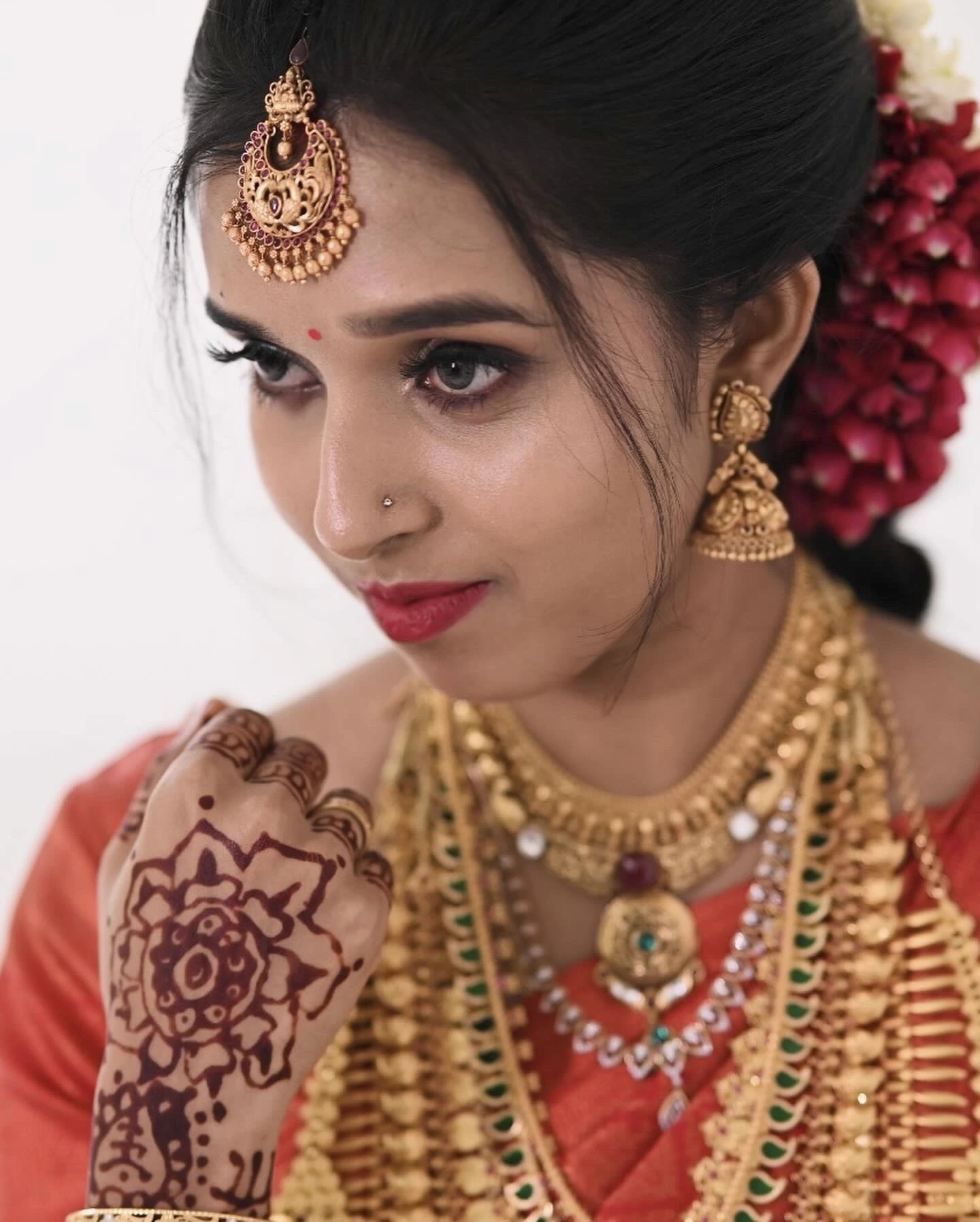 kerala bridal look in red saree