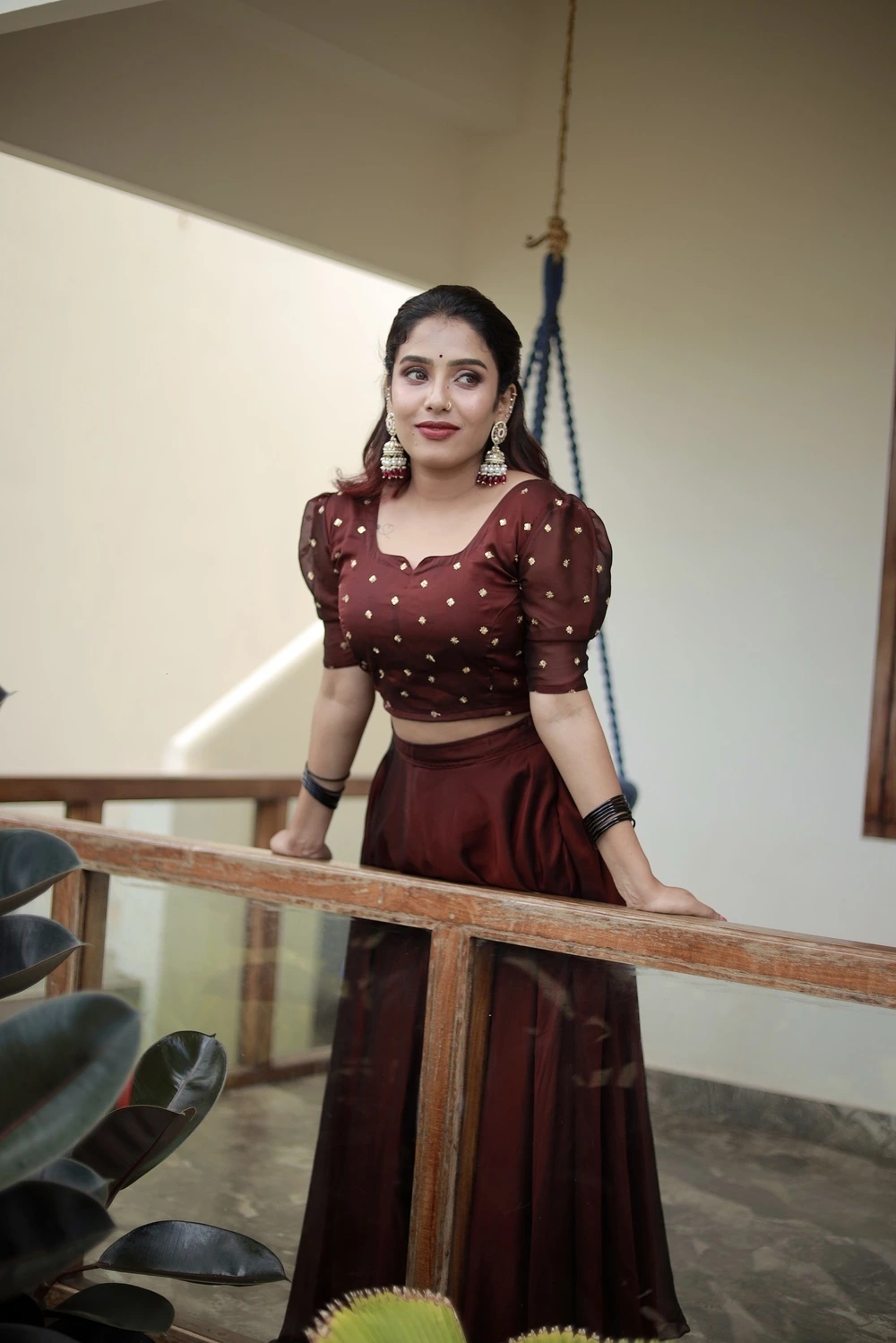 girl in maroon skirt and blouse